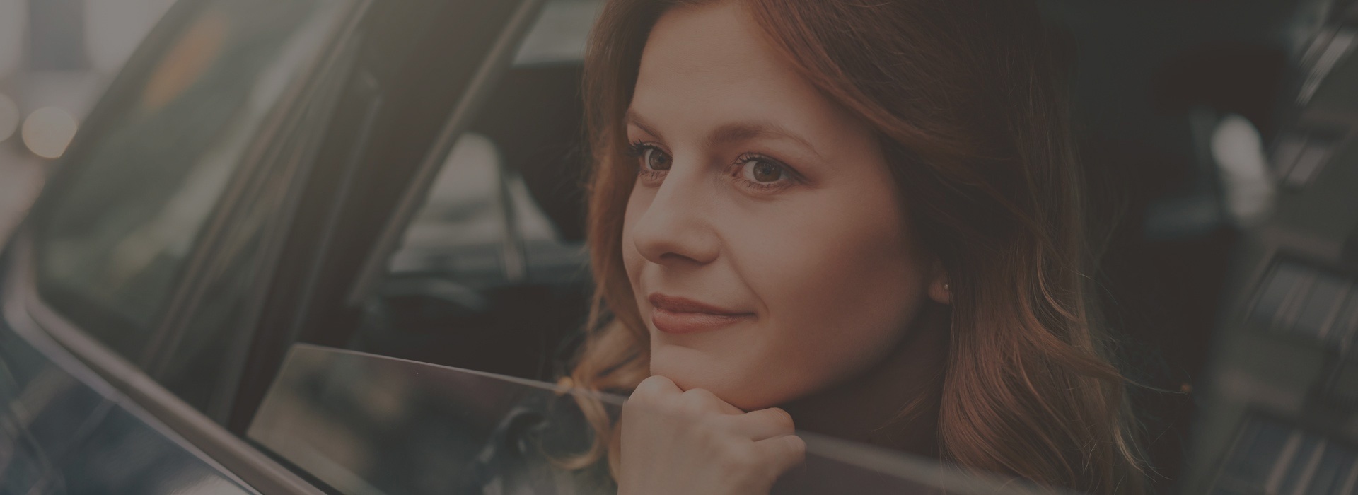 Woman Looking Through Car Window